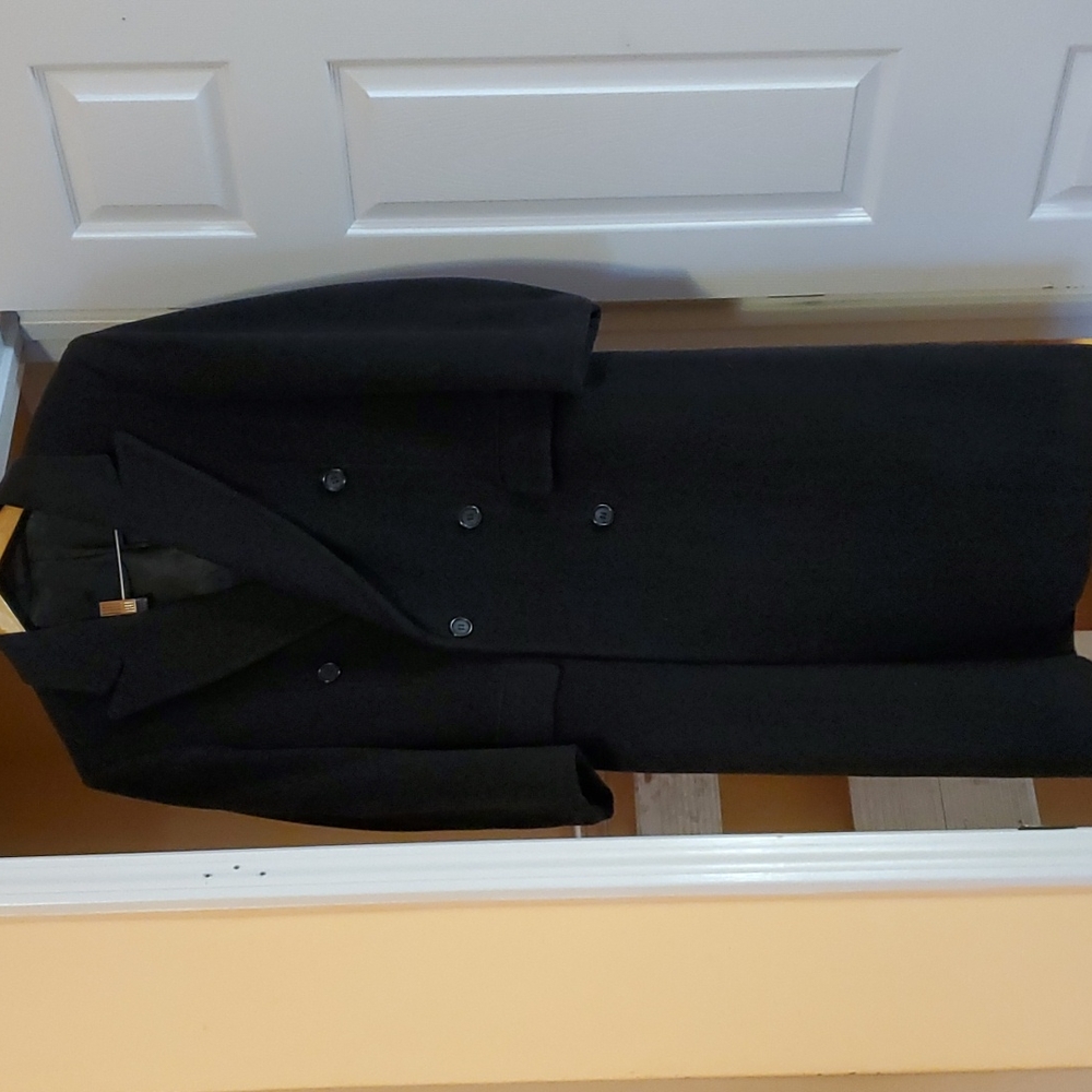 Wool coat full length fully lined like  pockets by Nino Cerruti. Like new.